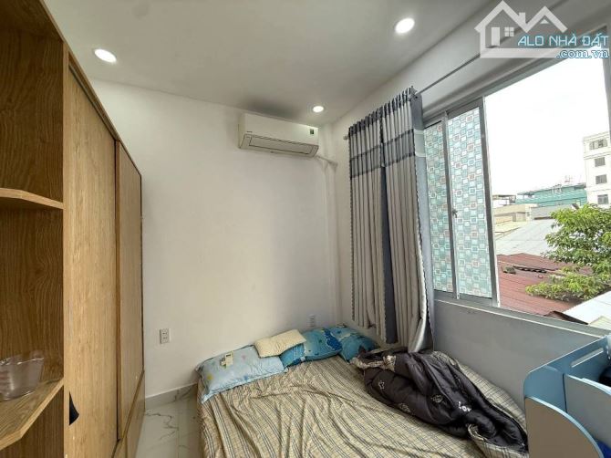 Bán nhà đường Thống Nhất Phường 15 Quận Gò Vấp 25m2 giá 2 tỷ 970 có 2 tầng 2 phòng ngủ - 2
