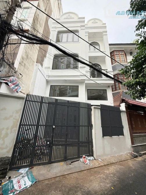 Bán nhà 4 tầng BTCT gần sân bay Tân Sơn nhất 6.2*15 giá 13t5 - 2