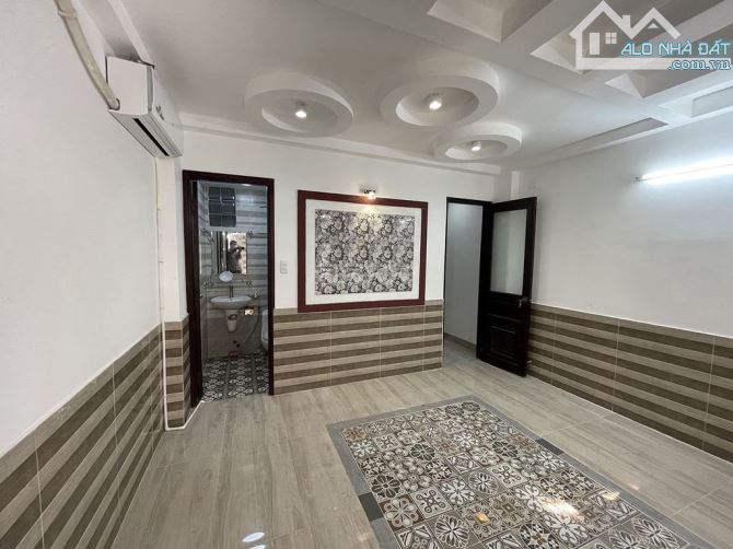 Bán tòa CHDV đường Phổ Quang, Tân Bình, DT: 5x30m, hầm 6 tầng, HDT 110tr, giá 29 tỷ TL - 2