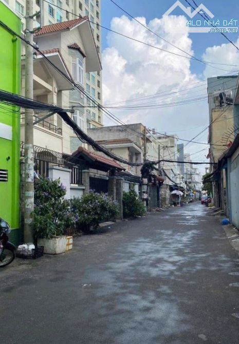 Nhà Vị trí KD Hẻm thông 5m xe hơi Nguyễn Hữu Cảnh - 2
