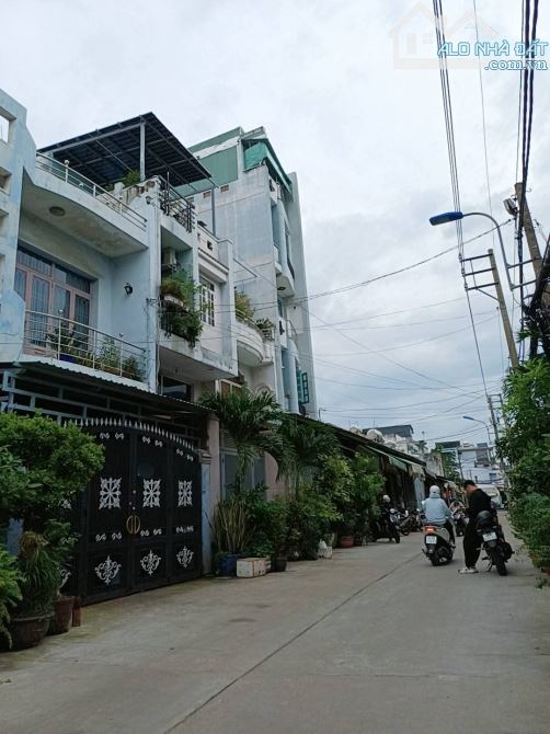 NHÀ SÁT MẶT TIỀN TRẦN BÌNH TRỌNG NGÃ TƯ TRẦN HƯNG ĐẠO,5 TẦNG,44M2,4PN,HẺM XE HƠI,GIÁP Q1 - 4