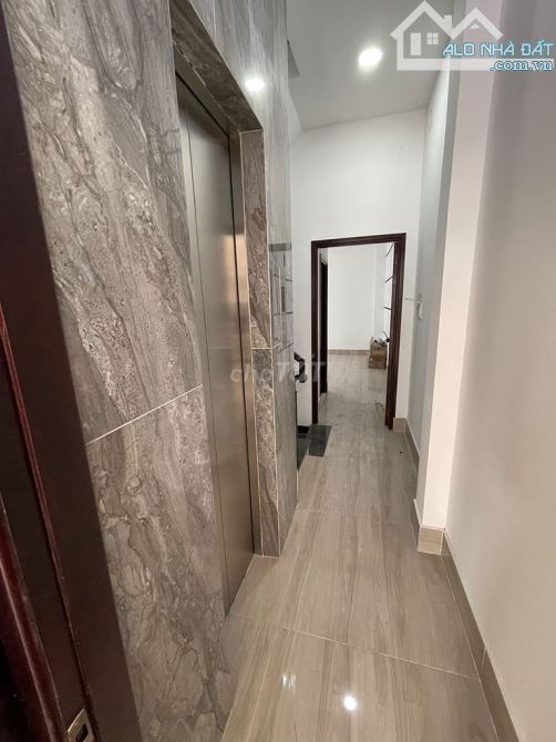 Bán tòa CHDV đường Phổ Quang, Tân Bình, DT: 5x30m, hầm 6 tầng, HDT 110tr, giá 29 tỷ TL - 5