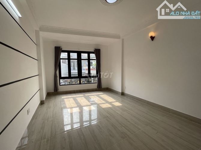 Bán tòa CHDV đường Phổ Quang, Tân Bình, DT: 5x30m, hầm 6 tầng, HDT 110tr, giá 29 tỷ TL - 6