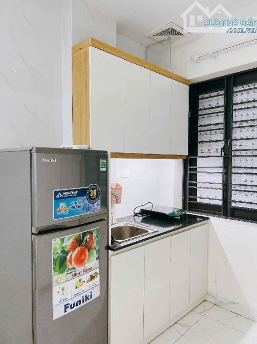 Bán nhà Hoàng Văn Thái, 82m, 7 tầng thang máy, ô tô tránh, D.thu 1.2 tỷ/năm, PCCC đủ,28 tỷ