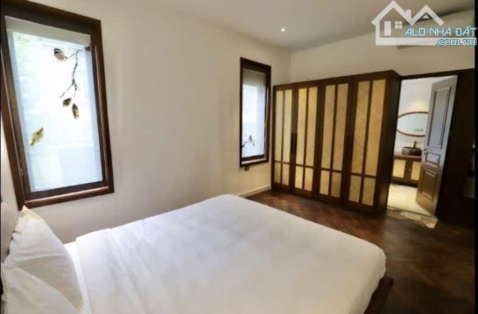 Bán nhà Xóm Chùa 114m 7 tầng mặt tiền 7.3m giá chỉ 110 tỷ