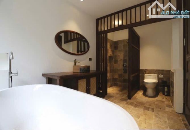 Bán nhà Xóm Chùa 114m 7 tầng mặt tiền 7.3m giá chỉ 110 tỷ