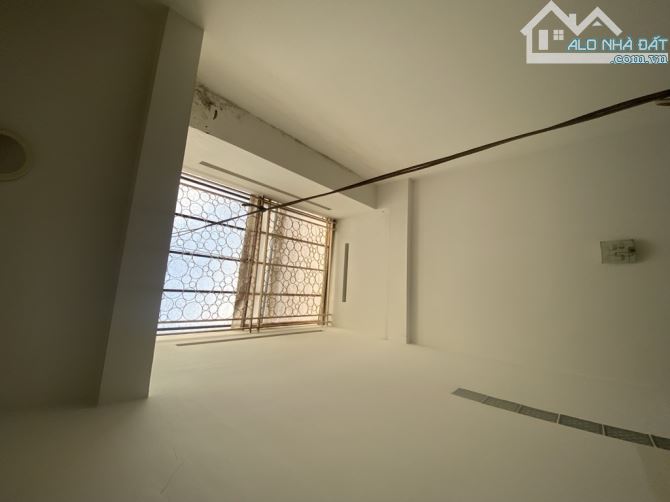 Nhà 2T ngay chợ lạc quang kinh doanh tốt tân thới nhất quận 12.(4.7x23) - 9.x tỷ - 5