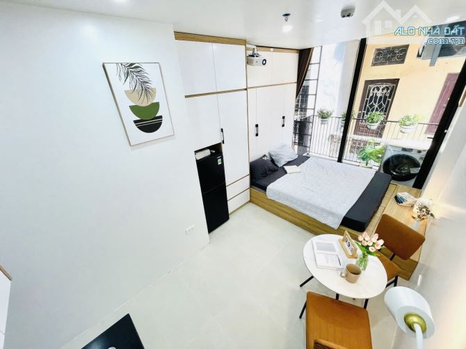 Bán toà CHDV Giải Phóng ngõ thông KD gần NEU 60m2*5T thang máy 12 PN DT800tr/năm, PCCC