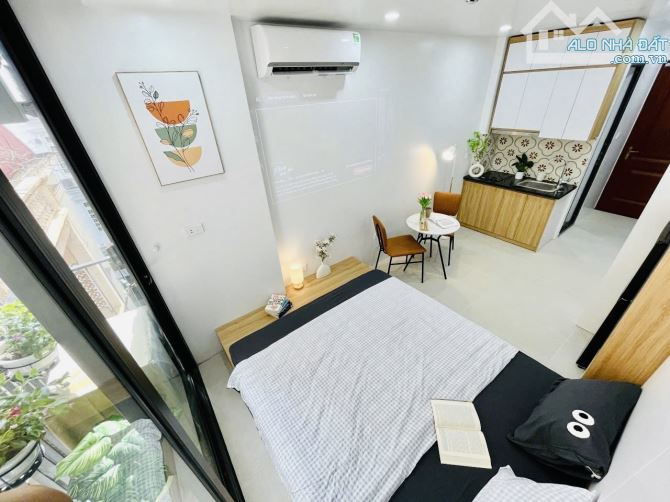 Bán toà CHDV Giải Phóng ngõ thông KD gần NEU 60m2*5T thang máy 12 PN DT800tr/năm, PCCC