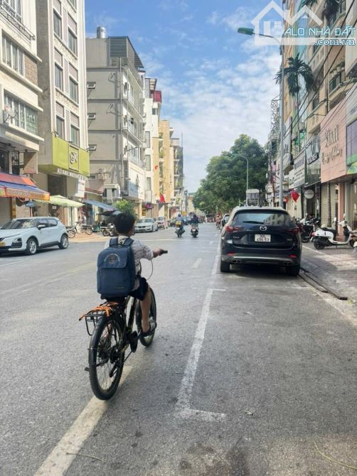 7T thang máy mặt phố Trung Phụng, DT 35tr, vỉa hè, KD, 2 thoáng