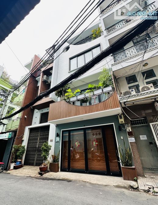 Bán căn nhà khu VIP Nguyễn văn Trỗi Phú Nhuận, DT: 6x15m, 96m2, nhà 3 tầng giá 12.8 tỷ