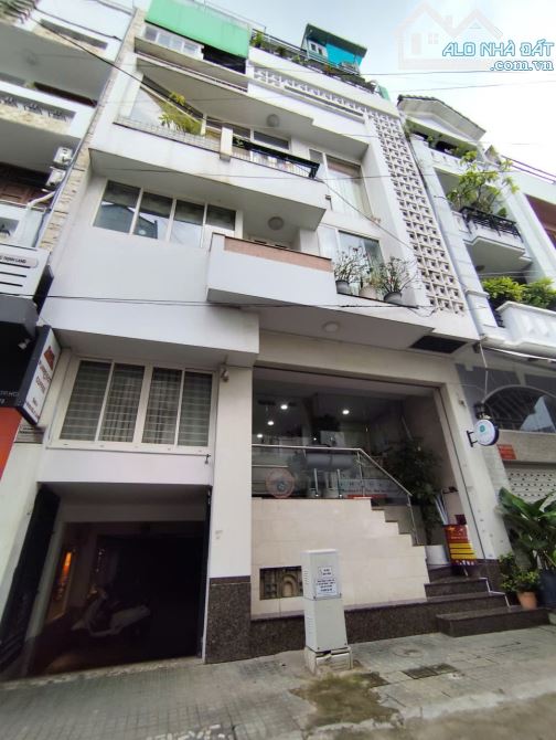 PHÚ NHUẬN – MẶT TIỀN ĐƯỜNG HOA SỮA – TOÀ NHÀ 7 TẦNG –128M2–HĐT 150TR/THÁNG– GIÁ 60 Tỷ.