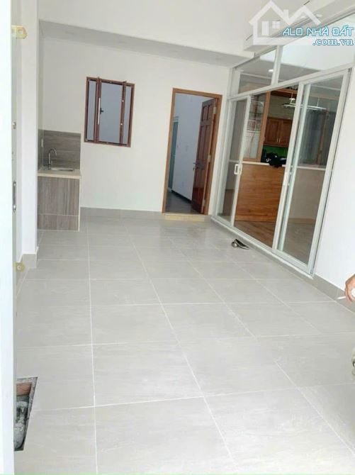 Nhà mới xây Quận 7, 3 căn + 2 trọ, SHR, cho thuê ổn định - 1
