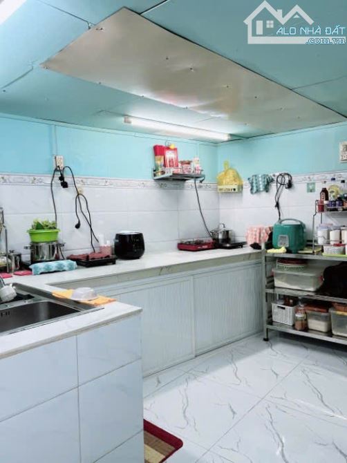 Nhà cũ DT 70m nở hậu 5m Nguyễn Khoái p2 Quận 4 KDC hiện hữu - 2