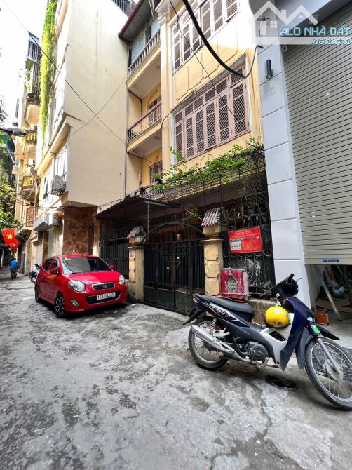 BÁN NHÀ HÀO NAM ĐỐNG ĐA 52m 7Tầng Mt 4m GIÁ 21.5 TỶ THANG MÁY GARA Ô TÔ KINH DOANH.