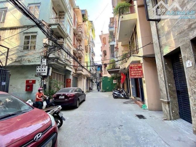Tòa nhà lô góc 65m2*7T Cổ Nhuế, nhà mới thang máy, 2 mặt ngõ ô tô tránh kinh doanh 17.5 tỷ