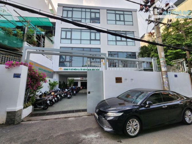Bán Tòa Nhà HXH Nơ Trang Long P.12 BT DT 742m2 KC 4 Tầng TM HĐT 240Tr - Giá 109 Tỷ