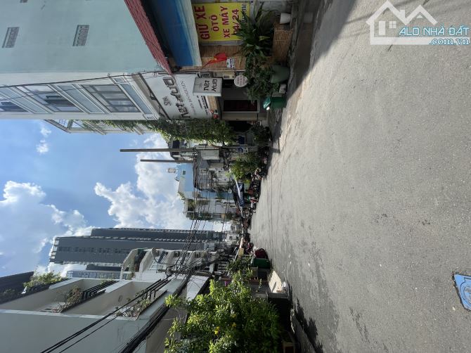 Nhà 4 tầng tại hẻm xe hơi thông 212B Nguyễn Trãi, P.Nguyễn Cư Trinh, Q1, HCM.