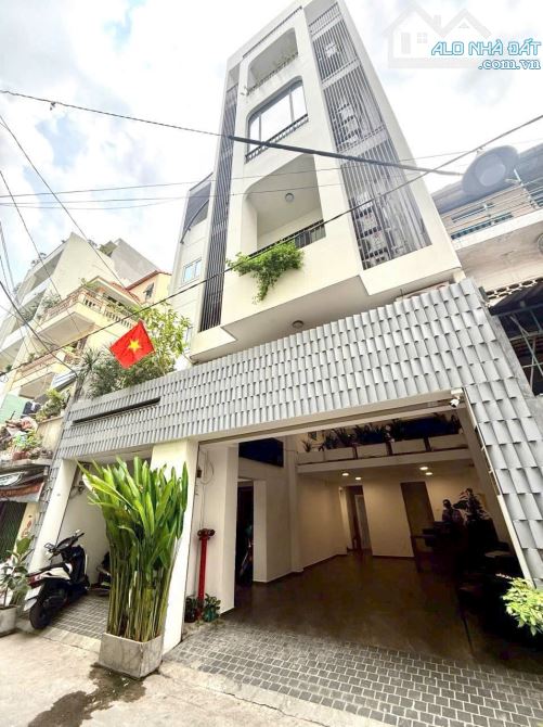 Toà nhà văn phòng ngang gần 9m - 5 Tầng thang máy - Nhà xây mới ở ngay