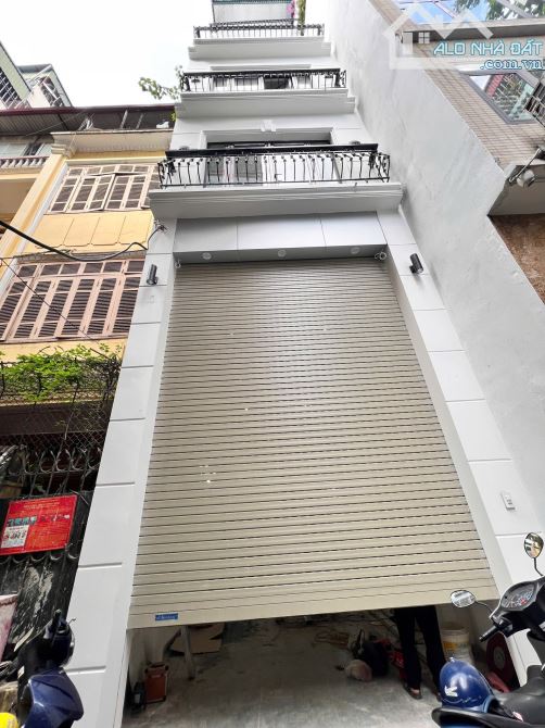 BÁN NHÀ HÀO NAM ĐỐNG ĐA 52m 7Tầng Mt 4m GIÁ 21.5 TỶ THANG MÁY GARA Ô TÔ KINH DOANH. - 1