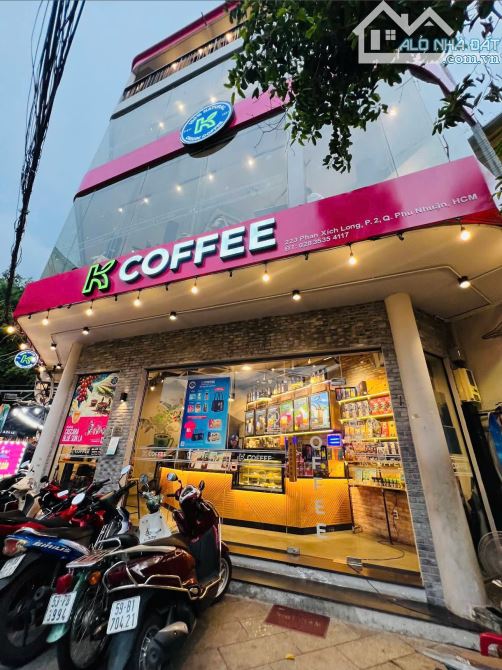 Cho thuê nhà góc ngã 4 Phan Xích Long Phú Nhuận - Trệt 3 lầu sàn trống suốt - giá tốt - 1