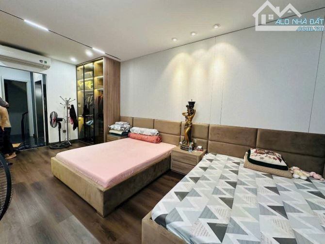 Ngõ vip Tây Sơn 6 tầng thang máy xịn xò, oto tránh đỗ 20m, 50m2 + VP. Giá 19 tỷ - 5