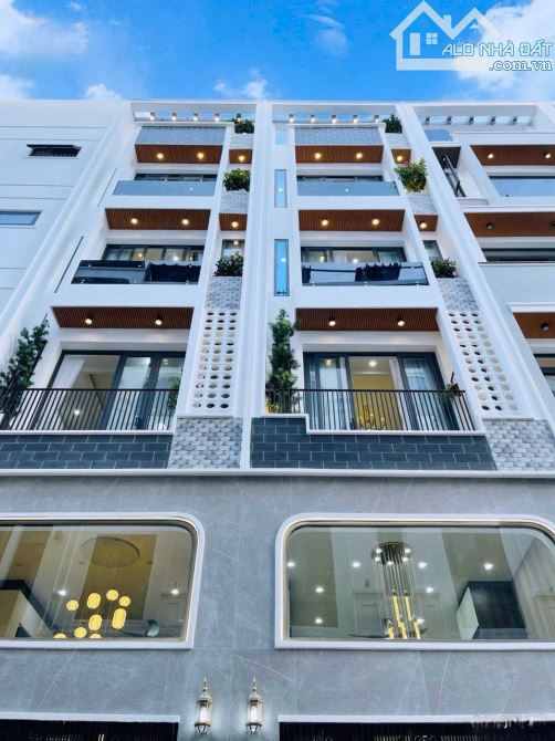 BÁN NHÀ NHỈNH 7 TỶ - CÓ THANG MÁY- HẺM XE HƠI GẦN EMART GÒ VẤP