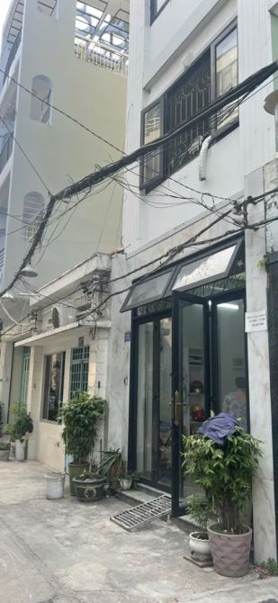 BÁN NHANH NHÀ ĐẸP 5 TẦNG 2 MẶT HẺM  10 PHÒNG – HXH – 1 PHÚT RA NHÀ THỜ TÂN ĐỊNH