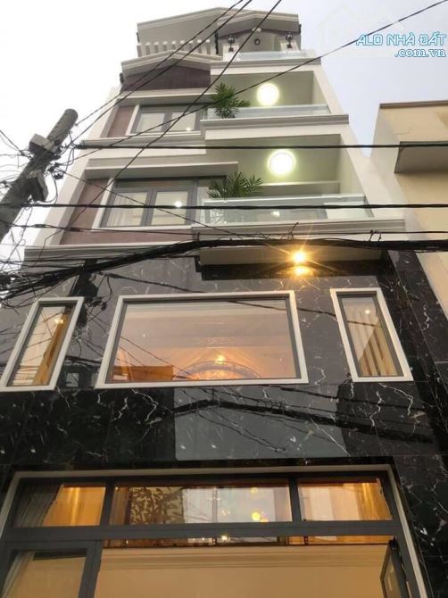 Mặt Tiền Hoa Hồng - Phan Xích Long, P2, Phú Nhuận. DT: 4x16m, Hầm 4 Tầng Mới