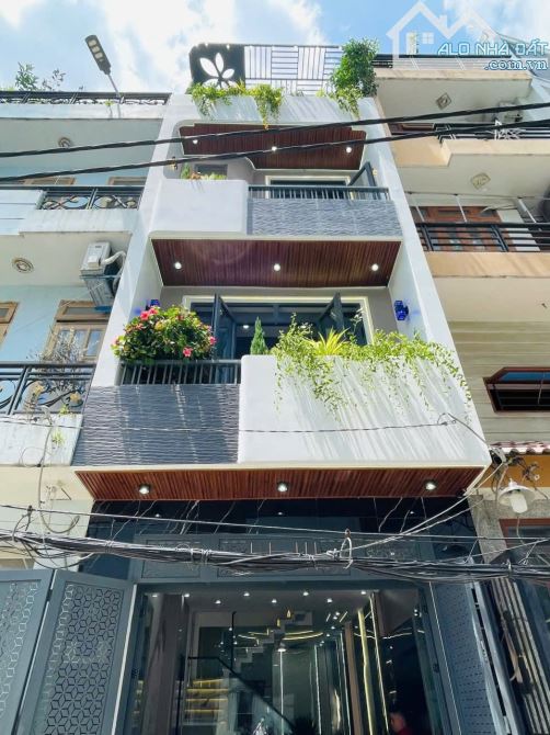 Bán nhà xây mới 100% hẻm xe hơi 4,5m đường số 44, P.14, 4 x 13, 4 tầng giá 6.85 tỷ tl