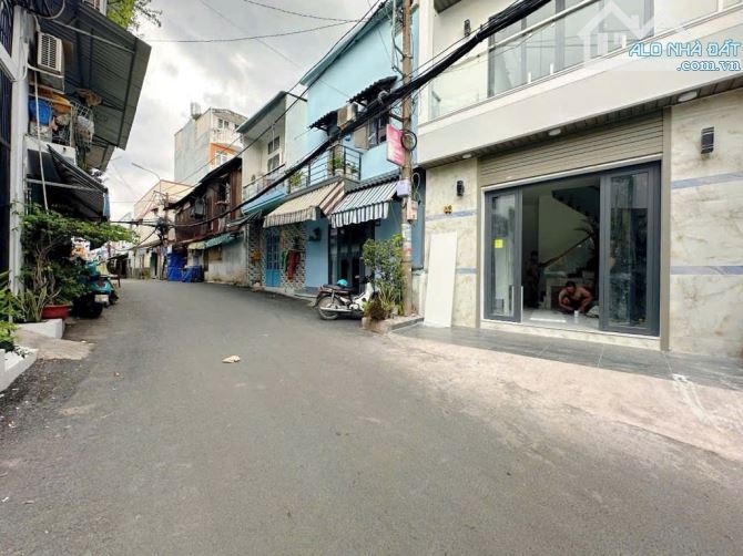 MẶT TIỀN TÚ MỞ , ĐỐI DIỆN VINCOM PHAN VĂN TRỊ , DTSD 69M2 , 3 TẦNG ĐÚC , CHỈ 4.X TỶ , GV
