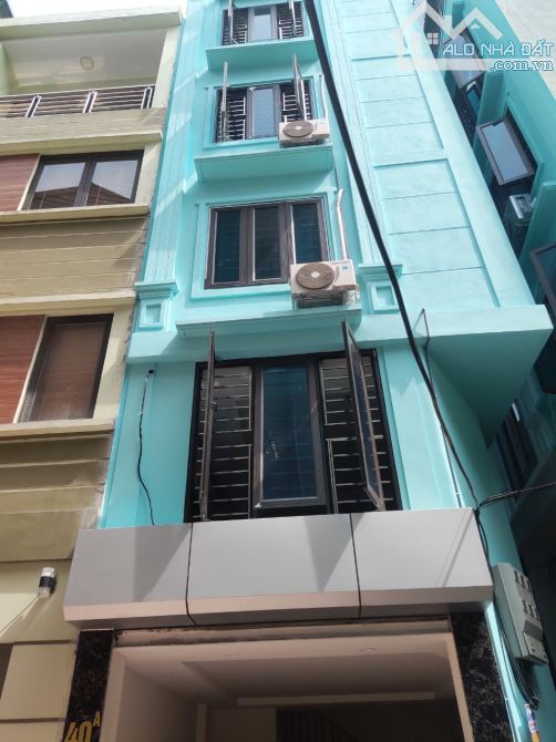 Cho thuê nhà nguyên căn diện tích 33m2 x 6 tầng, có gara ô tô , giá 9,5tr/tháng - 1