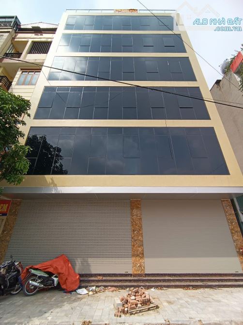Cho thuê nhà mặt phố Trần Quốc Hoàn, DT 60m x 5,5T, MT 7m thông sàn, thang máy, điều hoà - 2