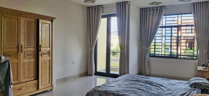 Mặt tiền Ngọc Tịnh-3 tầng full nội thất giá 8 tỉ 3 diện tích 108 m vuông vứt - 2