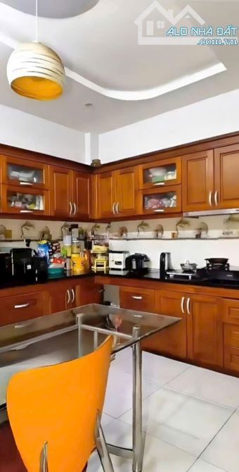 Góc 2 MTKD Lê Thiệt 4 tầng đúc BTCT 56m2 đường rộng 12m thông thương chỉ 10.xT - 4