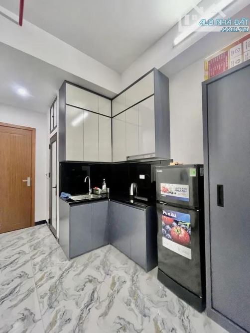 Bán nhà Đào Tấn, Toà Căn Hộ Dịch Vụ 70m2, 7 tầng, 15 pkk, mặt ngõ thông, gần phố giá 19 tỷ - 7