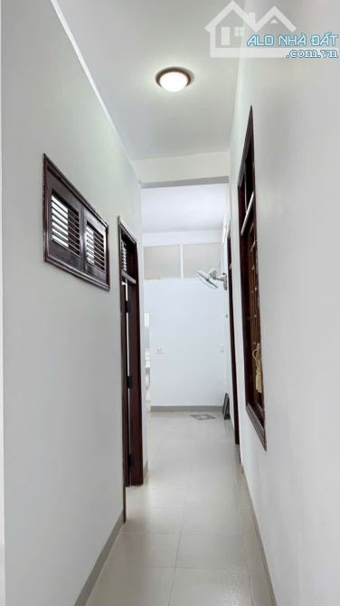 NHÀ 1 TRỆT 2 LẦU + 1 TUM MẶT TIỀN ĐƯỜNG AN DƯƠNG VƯƠNG - DT - 9