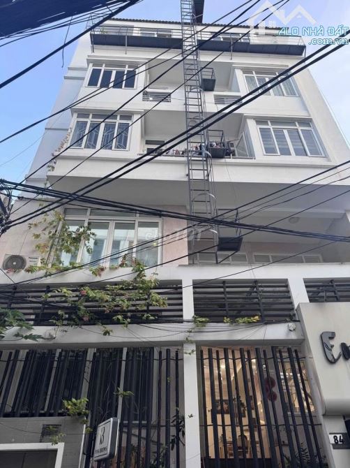 Bán nhà MT Phó Đức Chính P.1 BT, DT 10x10m CN 98m2, KC 5 tầng, HĐT 70tr/tháng, giá 21 tỷ