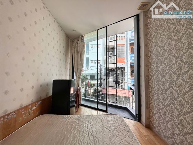 Cho thuê phòng ban công 30m2 tách bếp quận 3 gần công viên lê thị riêng, chợ hoà hưnh