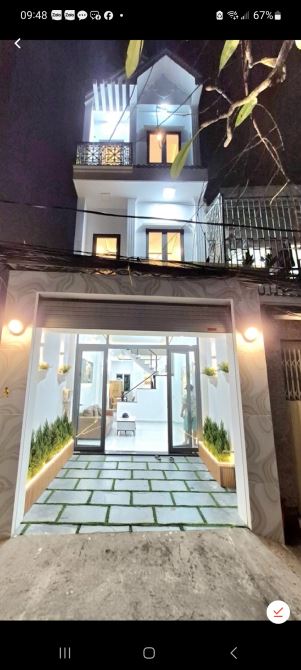 Nhà mới 3 tầng xe hơi ngủ trong nhà (4x15) nở hậu nhỉnh 7 tỷ Q7