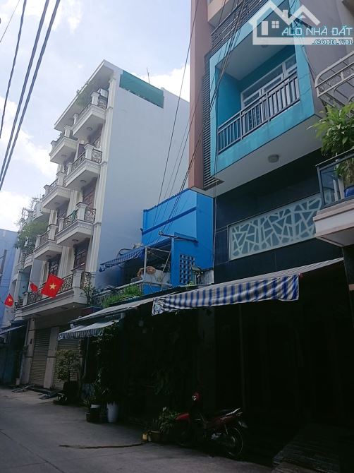 Cần bán gấp căn nhà Lạc Long Quân, p11, Tân Bình, Hồ Chí Minh. 101M2, NỞ HẬU - 1