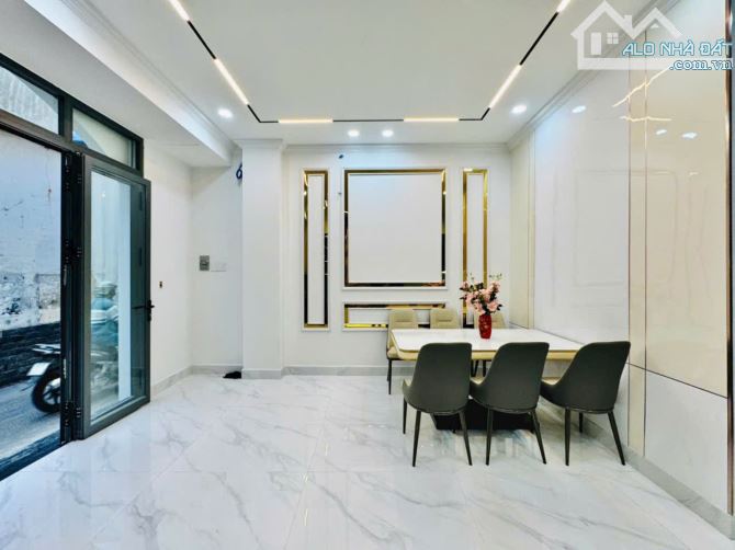 Bán nhà hẻm xe hơi sau lưng căn mặt tiền đường Nguyễn Du,P.7, 5 x 8, 4 tầng giá 6.92 tỷ tl - 1