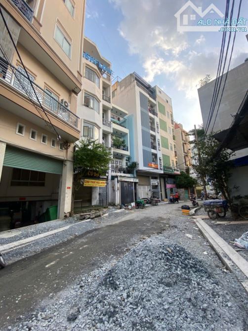 Bán đất 2 Mặt tiền đường Nhựa 8m Tân Bình Kế Nhà Ga T3 77m2 có Giấy phép 7 Tầng - 2