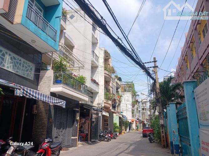 Cần bán gấp căn nhà Lạc Long Quân, p11, Tân Bình, Hồ Chí Minh. 101M2, NỞ HẬU - 2