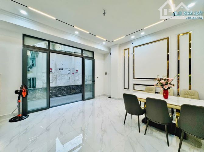 Bán nhà hẻm xe hơi sau lưng căn mặt tiền đường Nguyễn Du,P.7, 5 x 8, 4 tầng giá 6.92 tỷ tl - 2