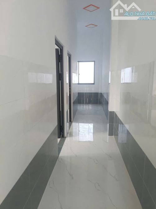 Cần Giuộc nhà 105m2 mặt tiền đường Tập Đoàn 8 Mỹ Lộc đã hoàn công giá đầu tư. - 3