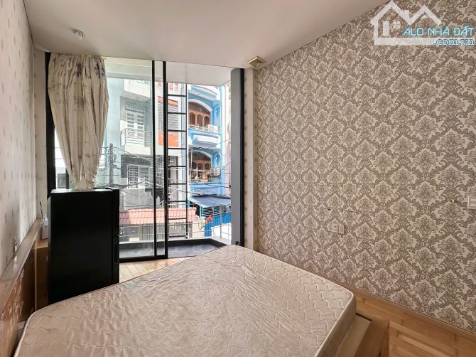Cho thuê phòng ban công 30m2 tách bếp quận 3 gần công viên lê thị riêng, chợ hoà hưnh - 4