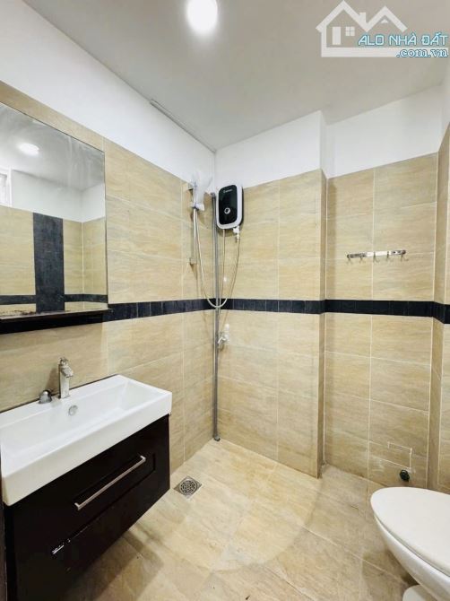 Bán nhà Phú Nhuận - khu phân lô - xe hơi - 5 tầng - kimh doanh - 4