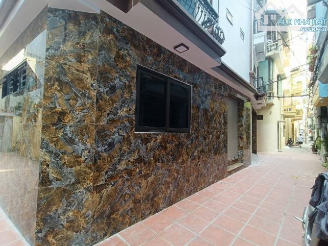 Trần cung   lô góc  ngõ thông ô tô đỗ cửa 7 tầng thang máy  mặt tiền rộng thoáng - 5