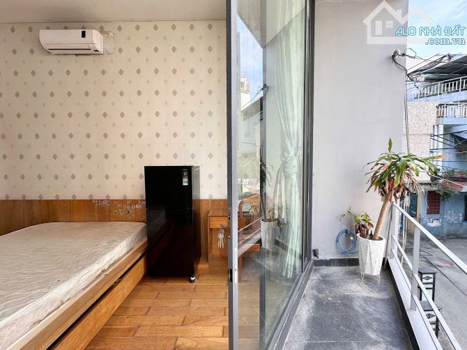 Cho thuê phòng ban công 30m2 tách bếp quận 3 gần công viên lê thị riêng, chợ hoà hưnh - 5